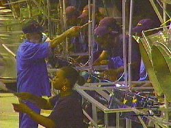 Pdvd_025_clive-bradley_in-front-de-band-desperadoes_panorama-semi-finals-2005_pointing-b_ncctv-ch4.jpg - 18676 Bytes